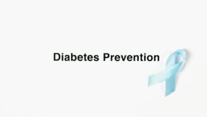 Image of a blue ribbon symbolizing diabetes prevention on a white background.